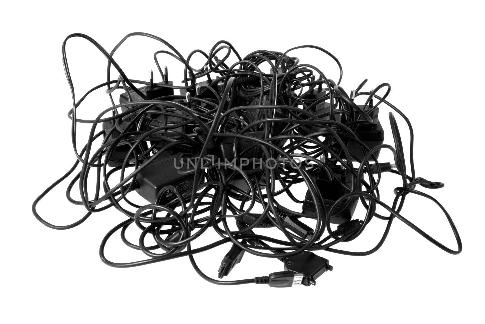 Tangled cables and connectors illustrating complex problems and obstacles.