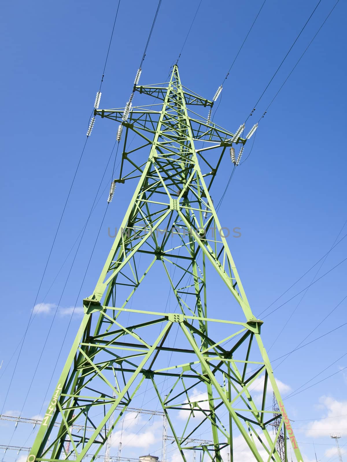 Single electricity tower against the blue sky