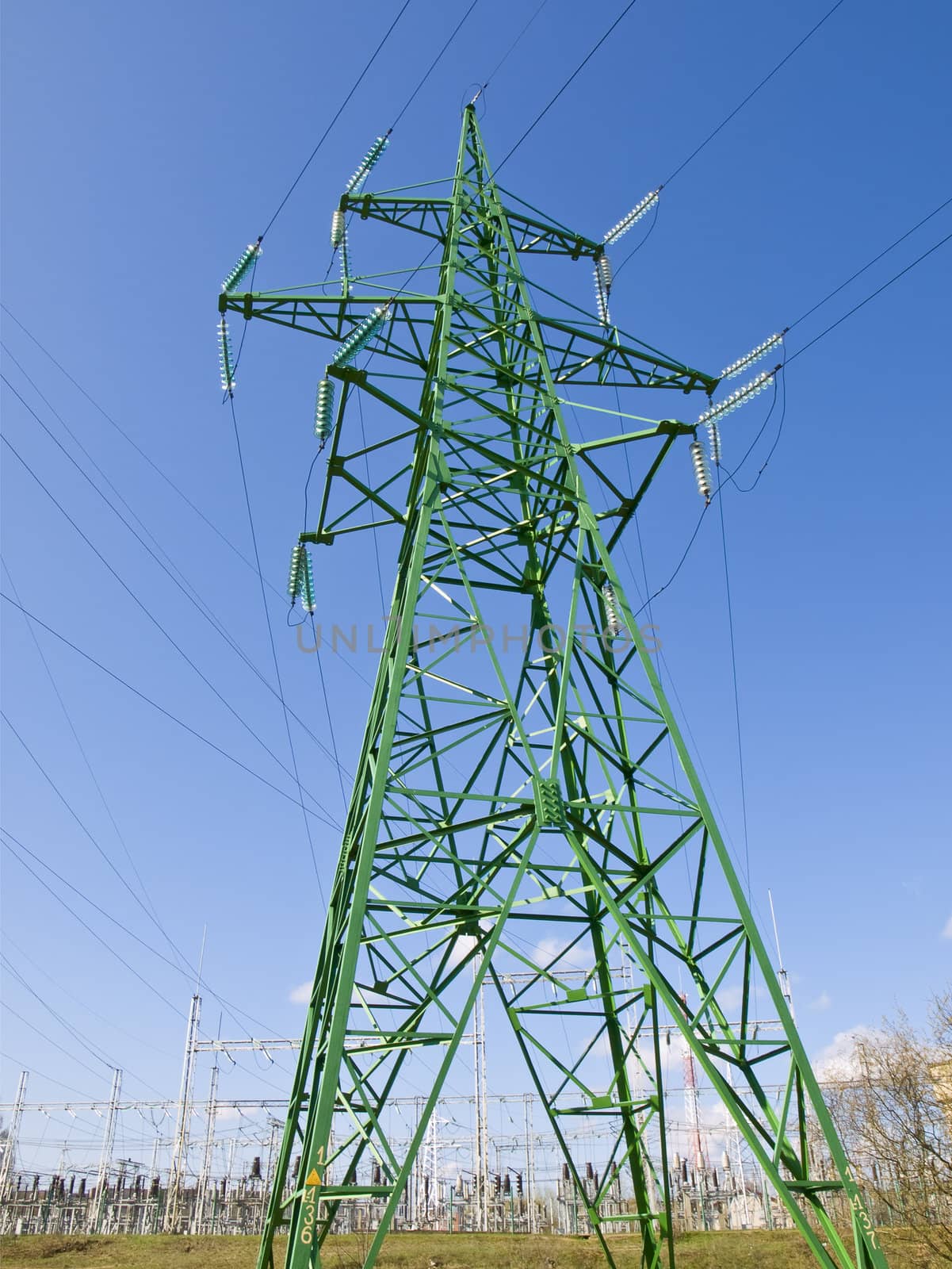 Single electricity tower against the blue sky