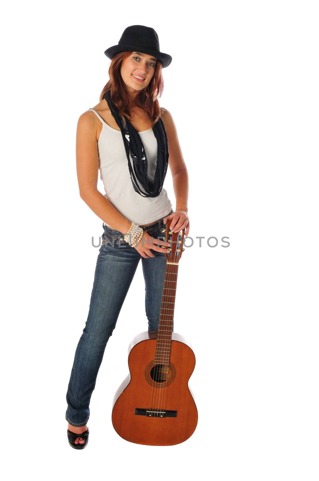 attractive woman with a guitar on white by PDImages