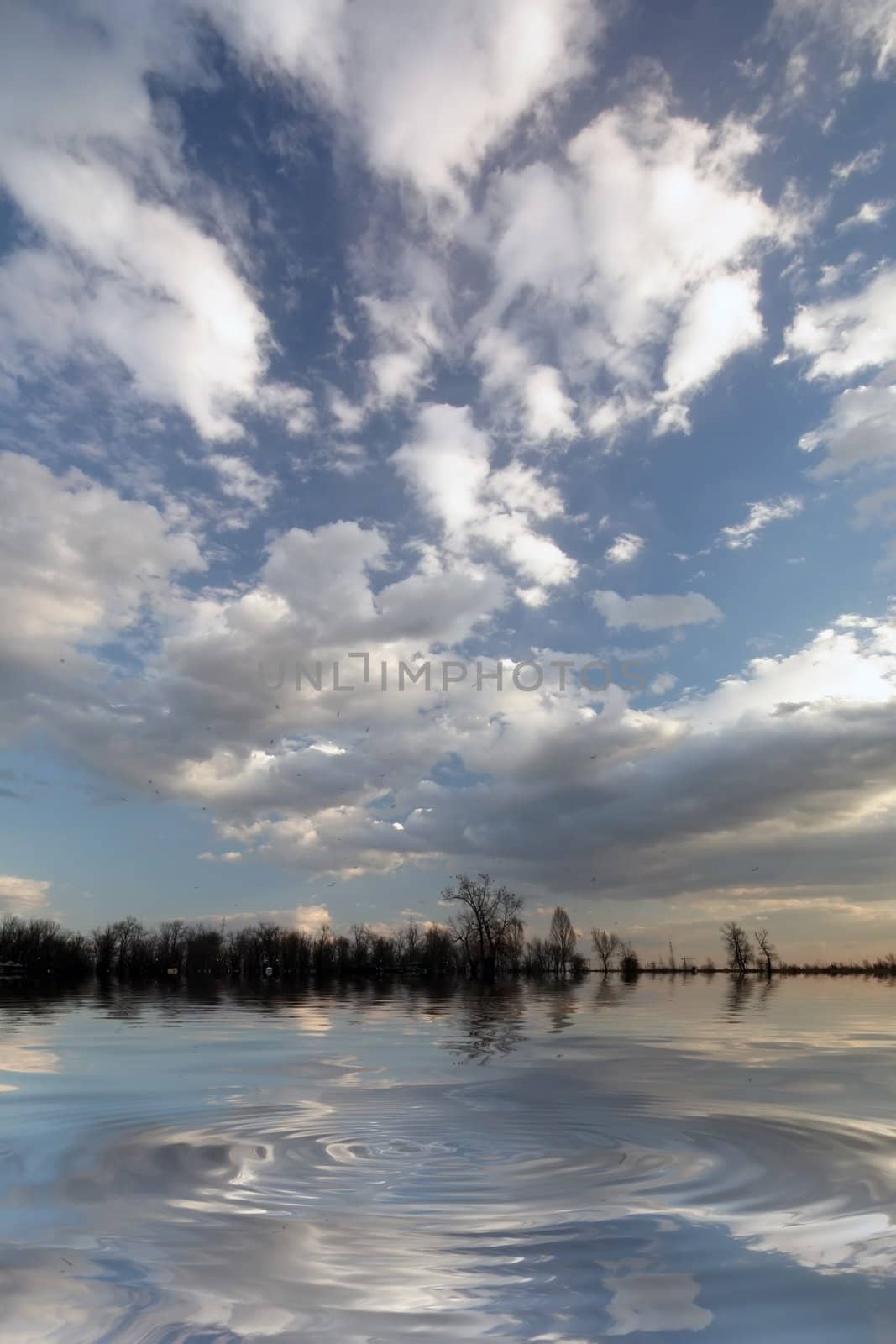 Beautiful sky with clouds and reflection