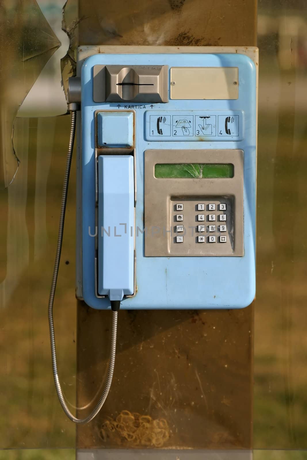 Public phone on a sunny day
