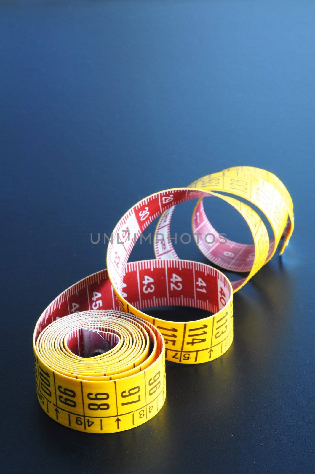 measuring tape showing diet or taylor concept