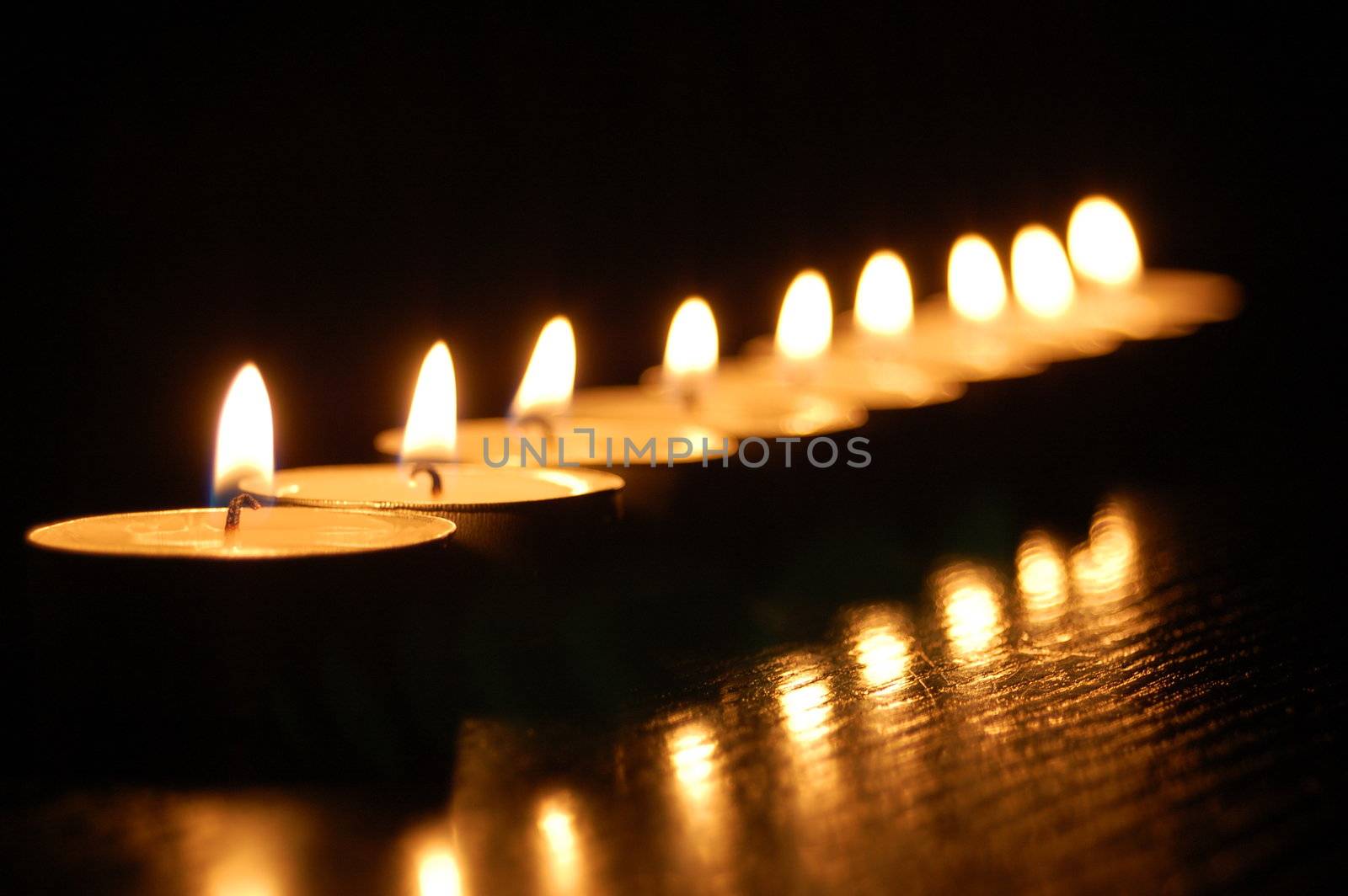 romantic hot candle light on black background