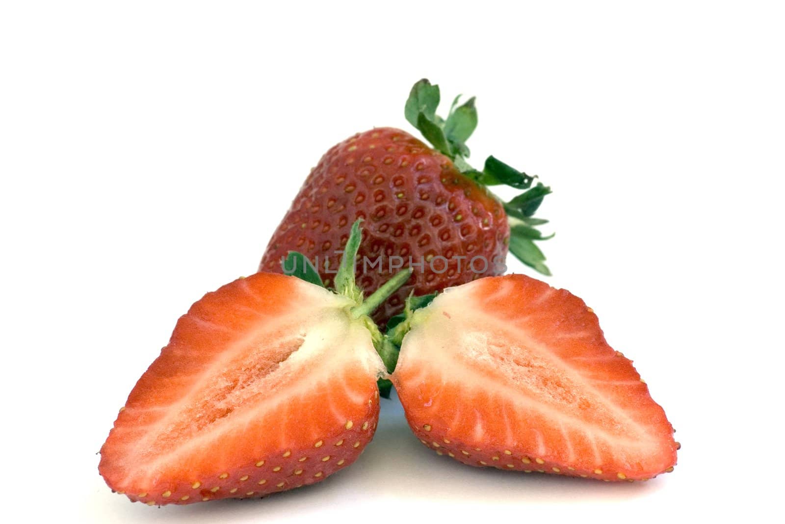 Healthy red strawberry fruit sliced and isolated on white background

