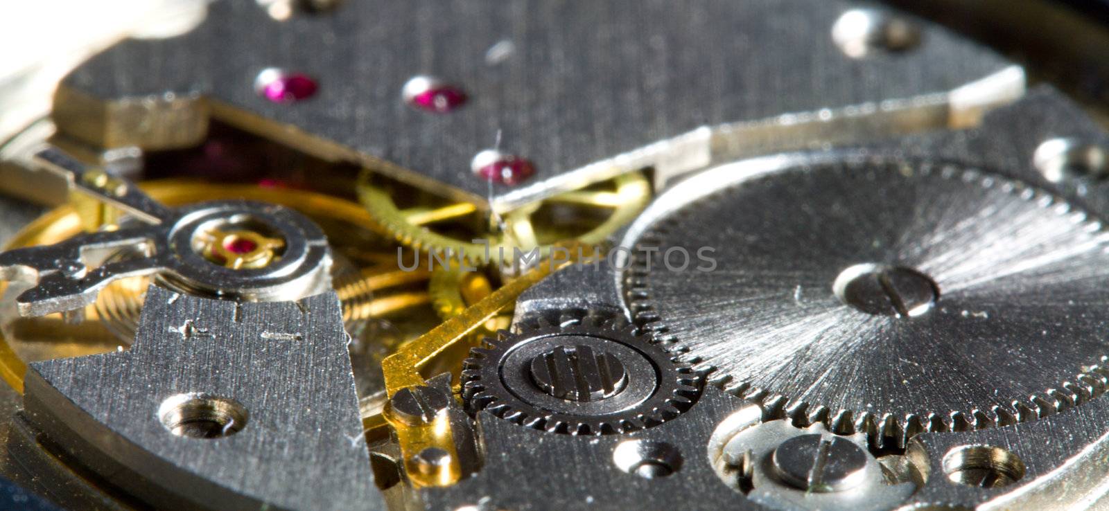 close-up part of clock mechanism, shalow dof