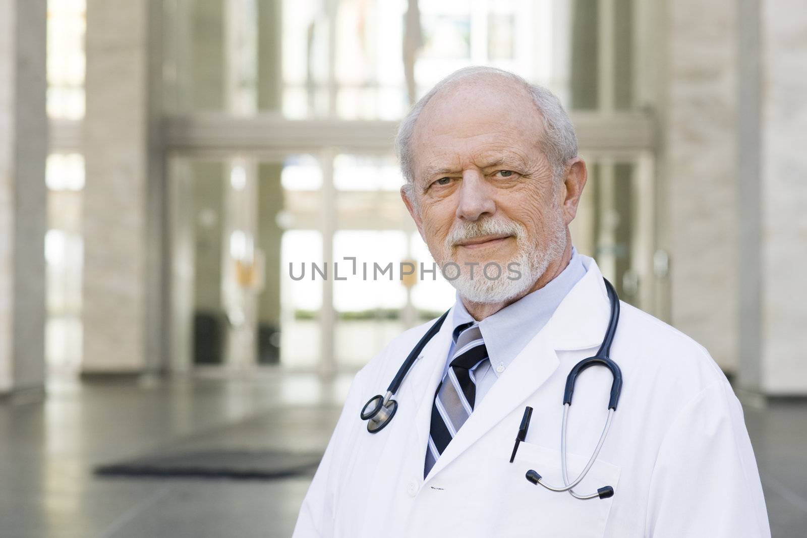 Doctor Standing Outside by ptimages