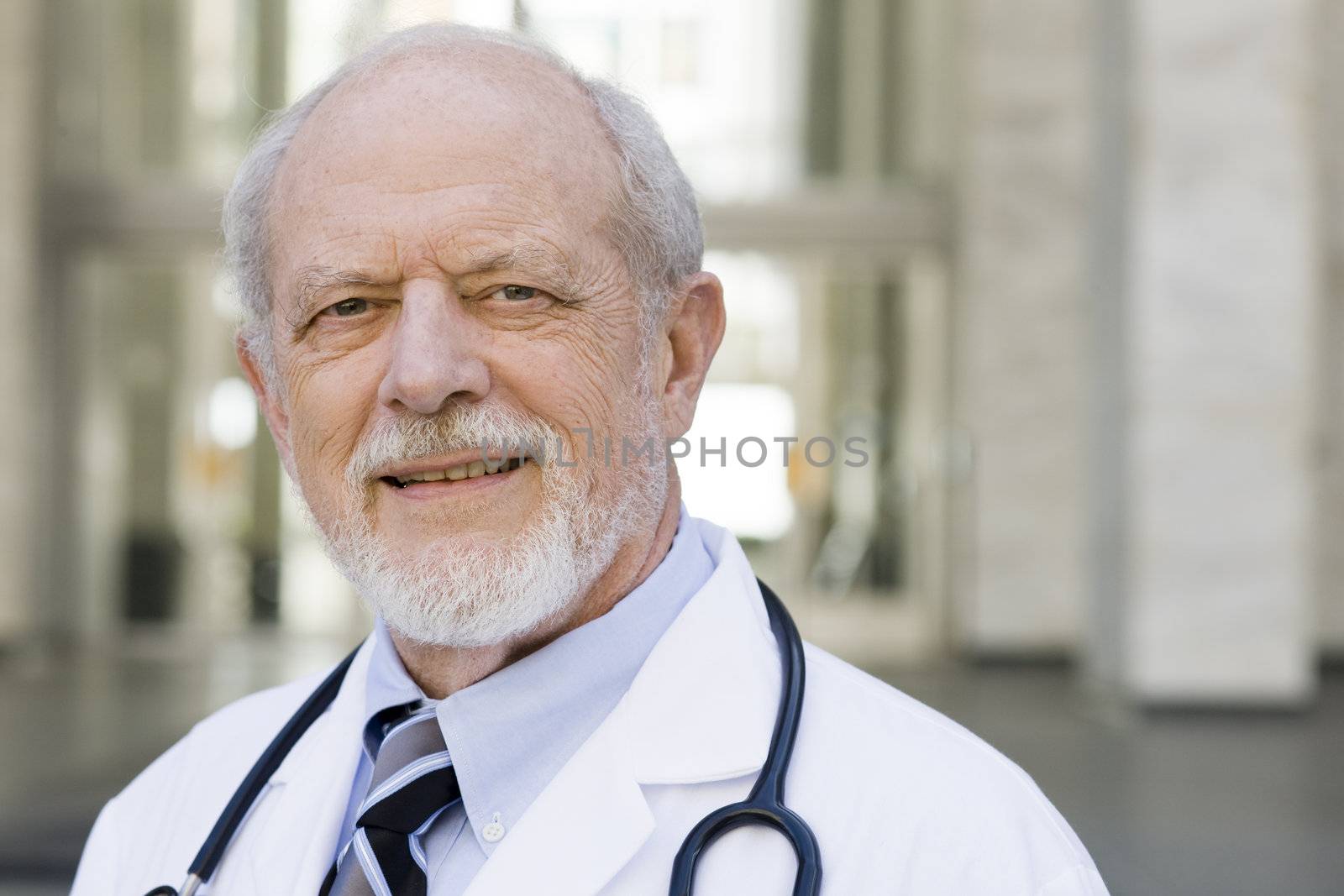 Portrait of an Old Male Doctor with a Stethoscope around His Neck