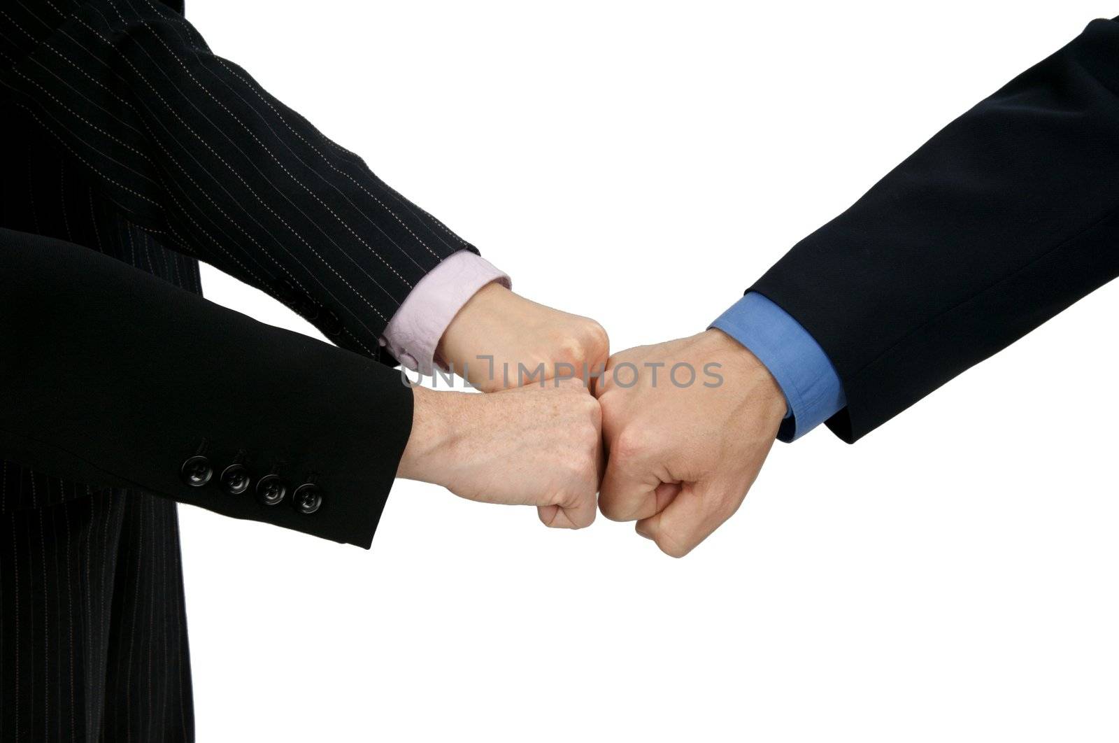 Image of three hands in a team building knuckle bump