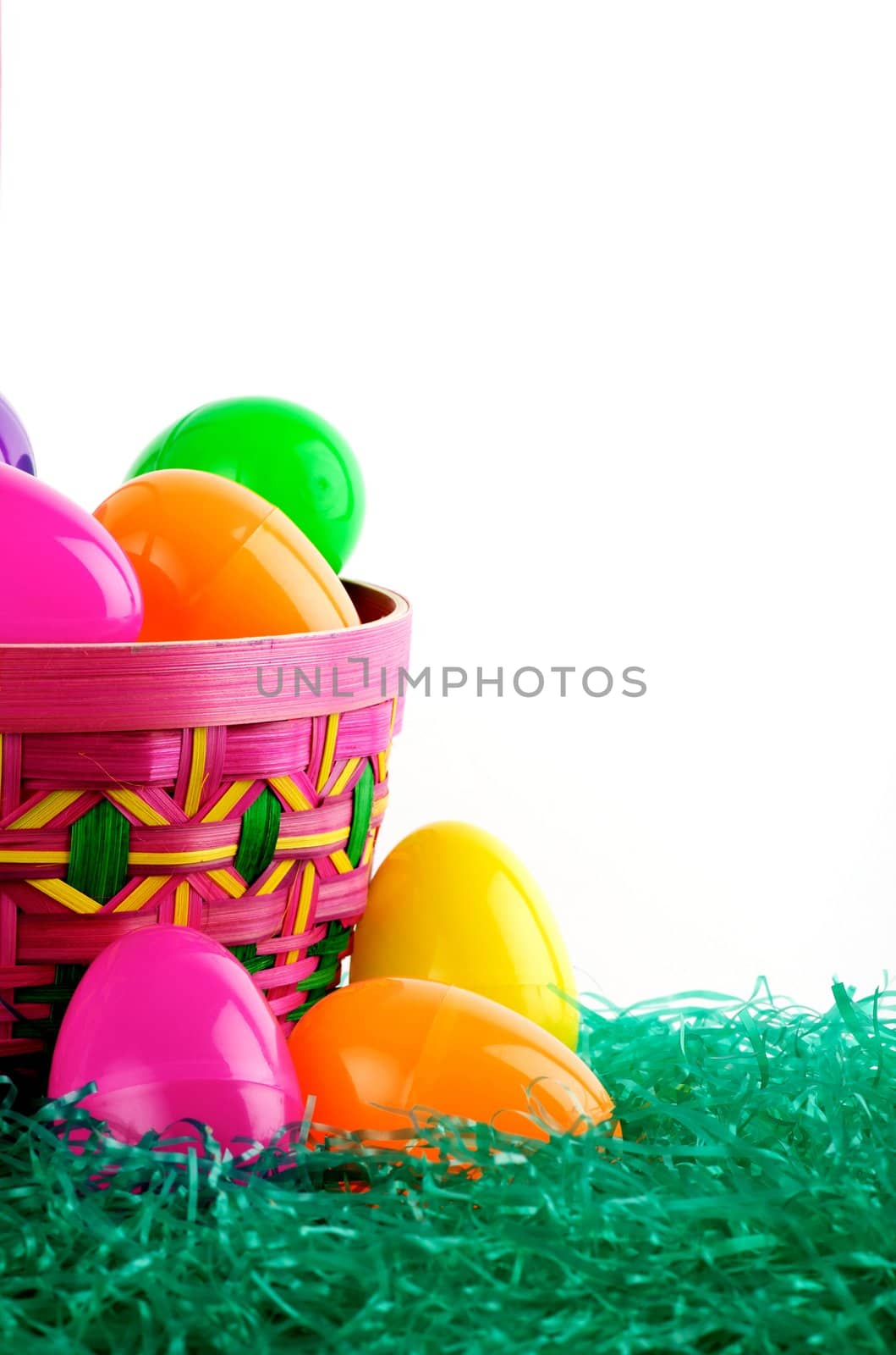 Image of Easter basket with colored eggs