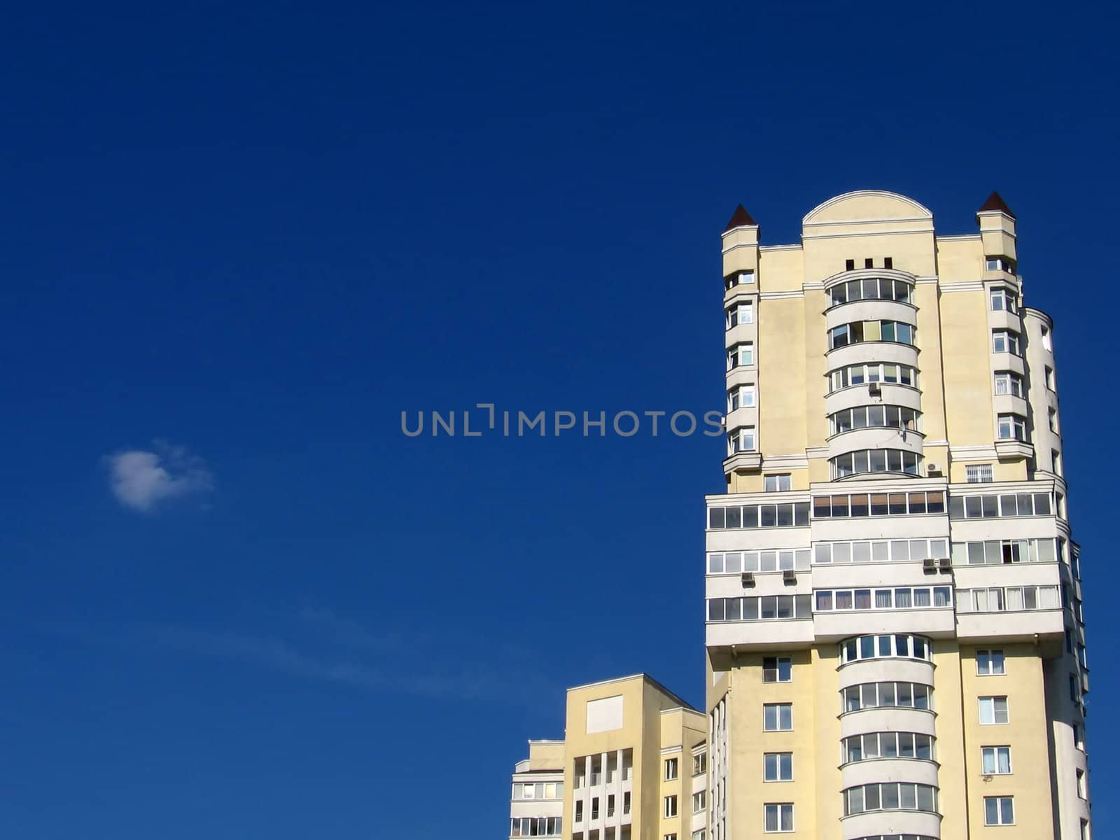 Very beautiful inhabited tower on a background of blue sky