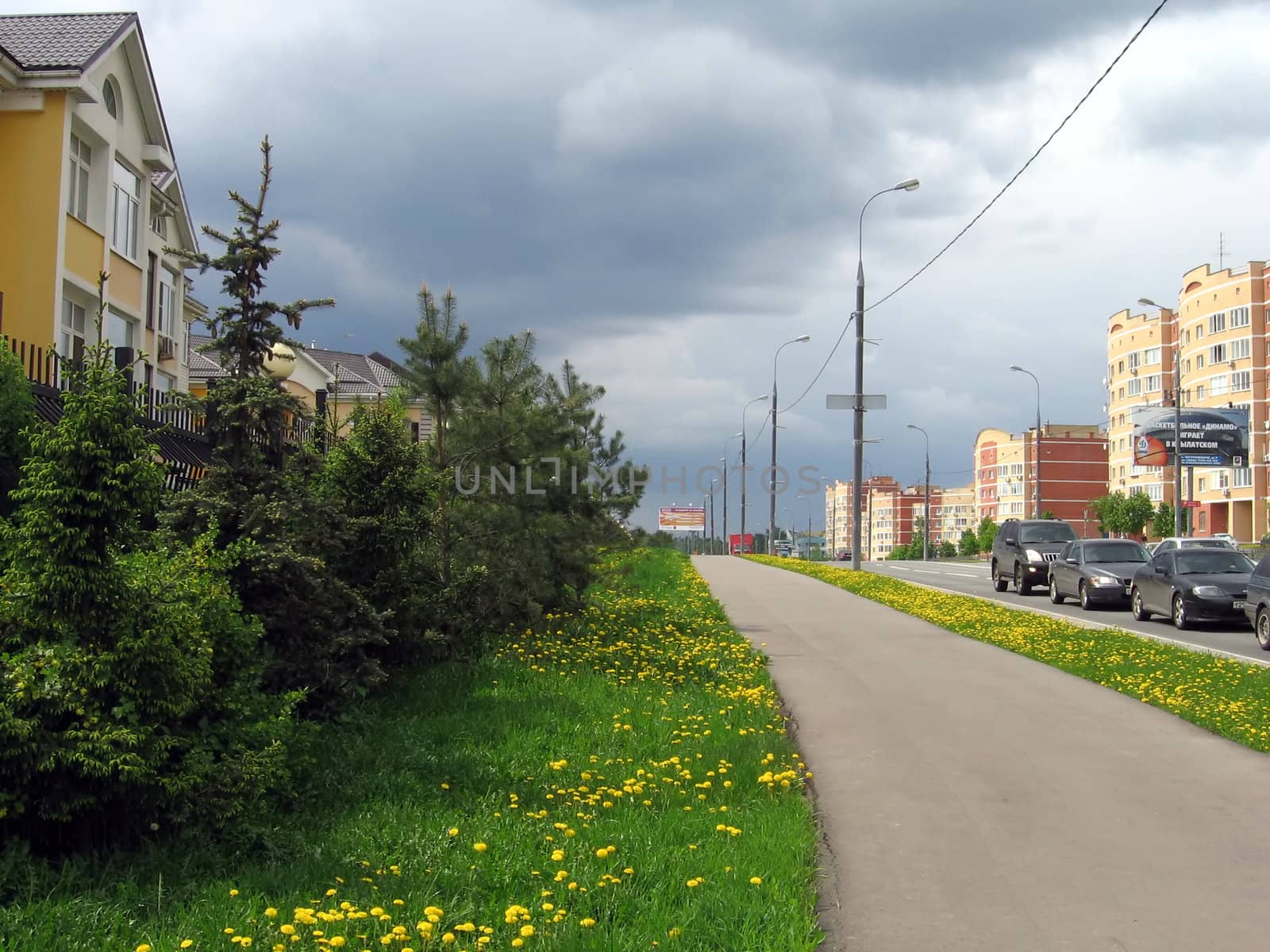 Automobile urban road in Moscow area at spring day