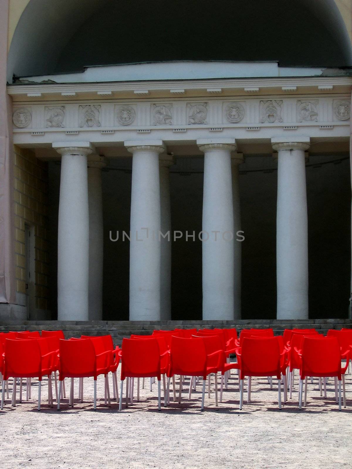 Chairs before a stage by tomatto