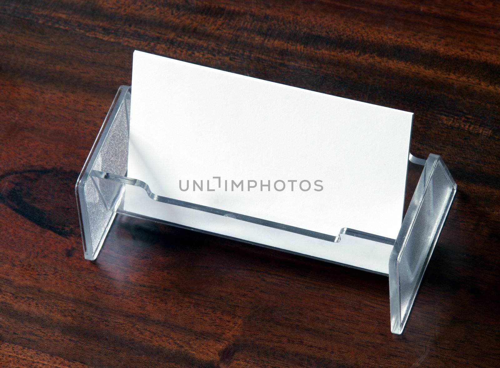 Blank Business Cards In Transparent Card Holder On Dark Wood Table