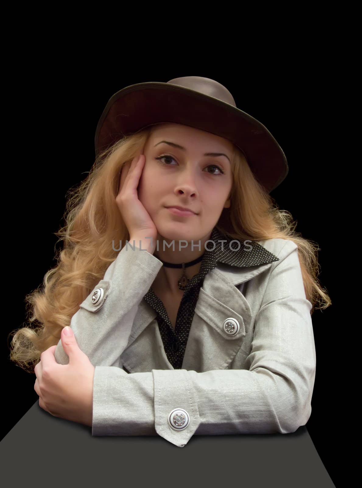The long-haired girl in hat on black