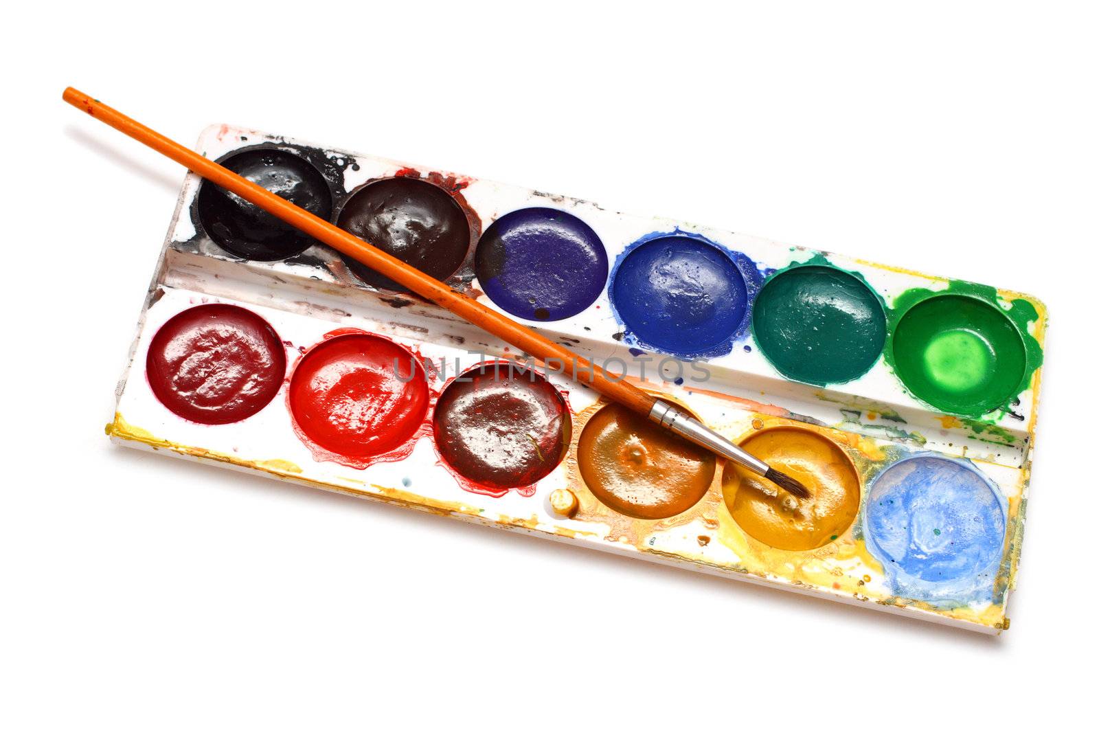 set of water-colour paints and brush isolated on white