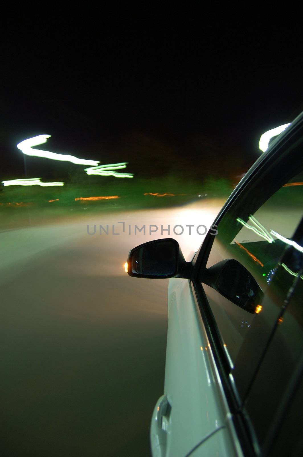 night drive with car in motion through the city shows the speed