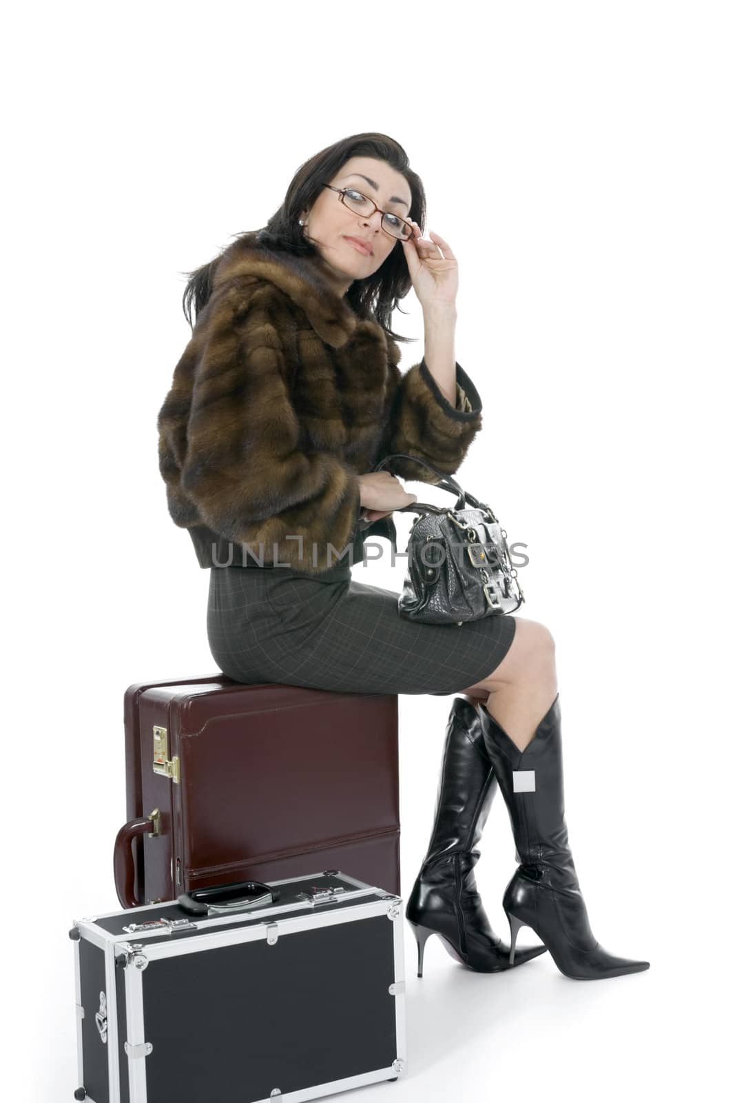 Young woman with  suitcase on  isolated background