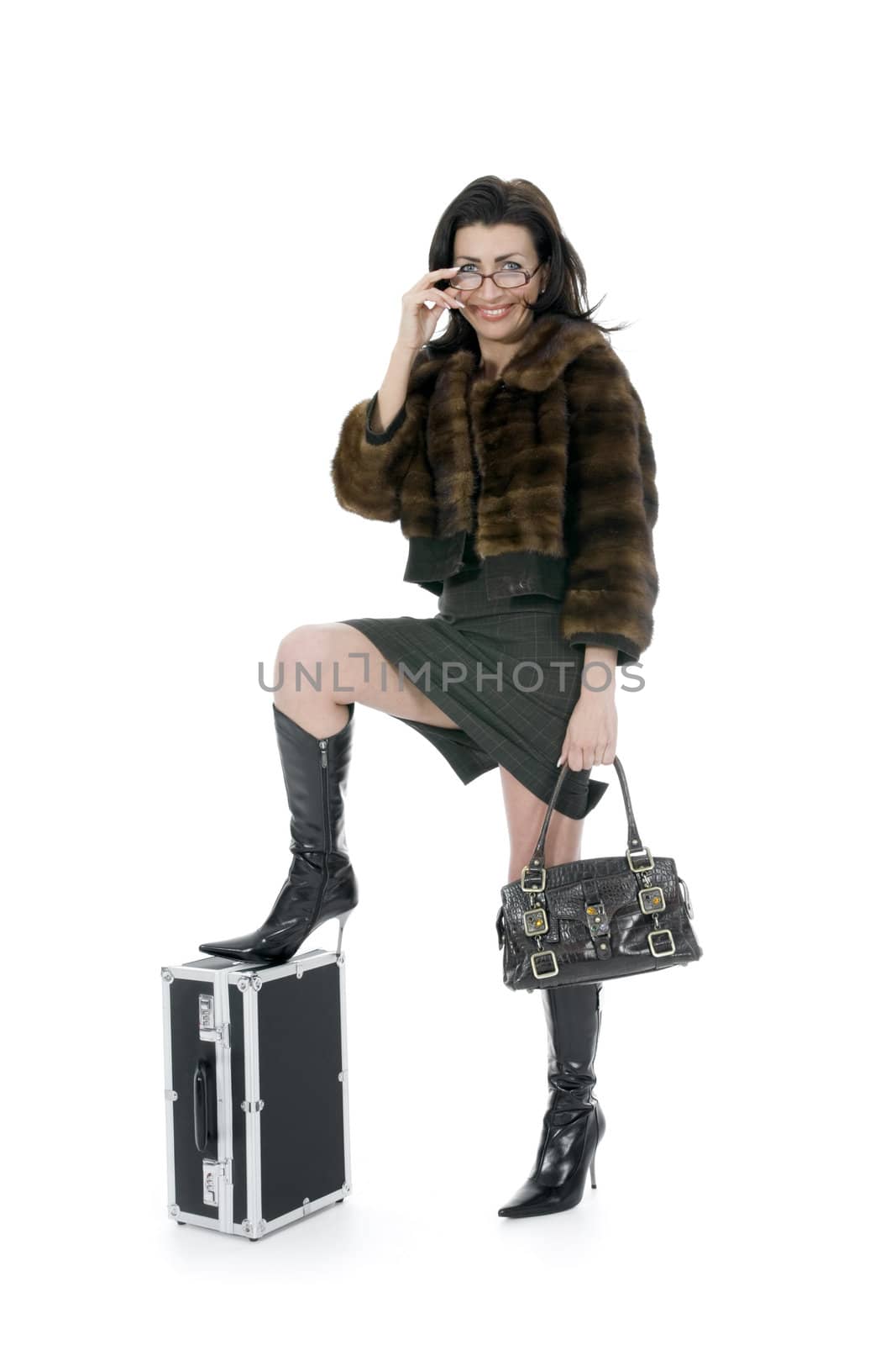 Young woman with  suitcase on  isolated background