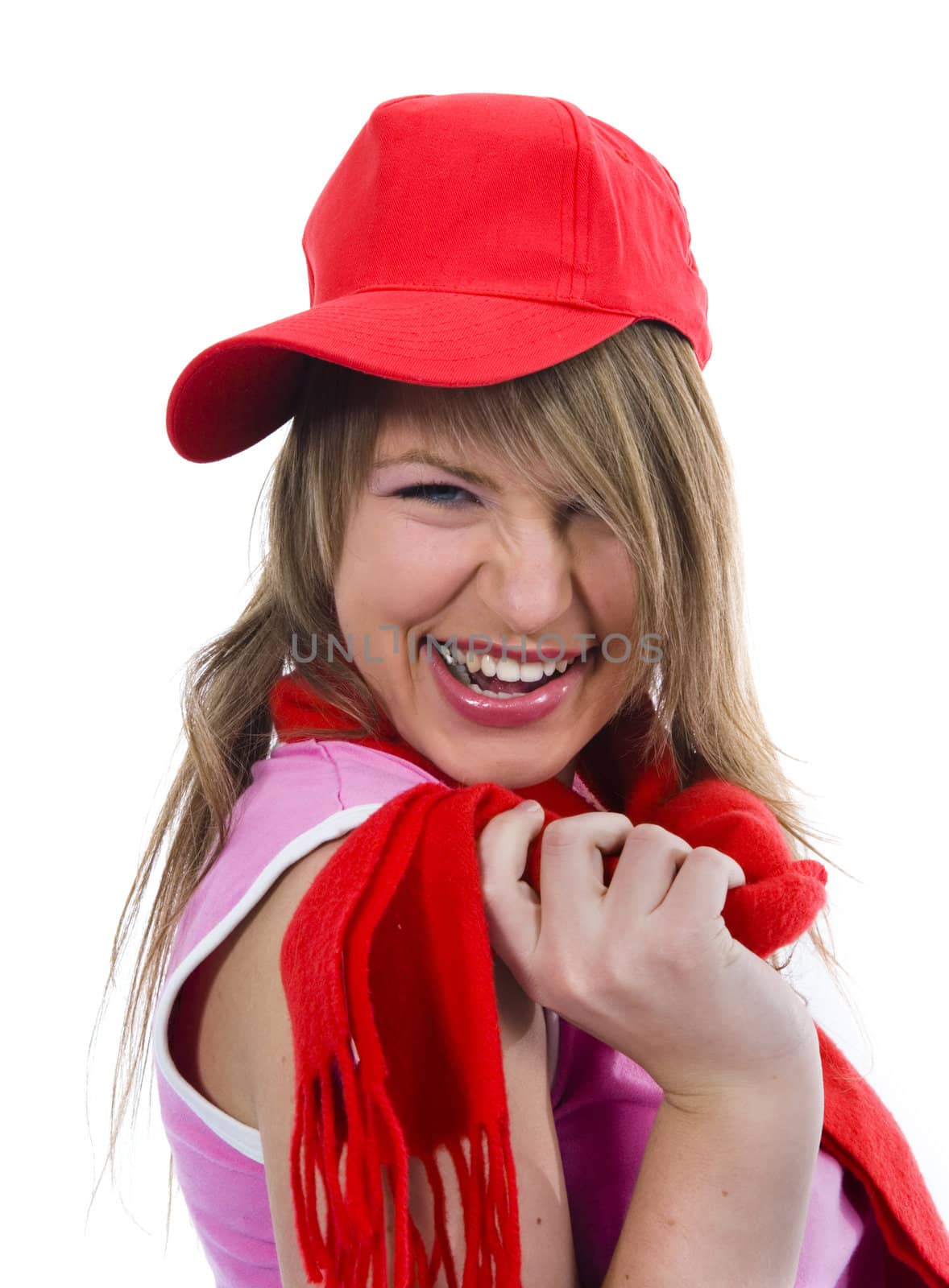 Beautiful  young woman in red cap on isolated background