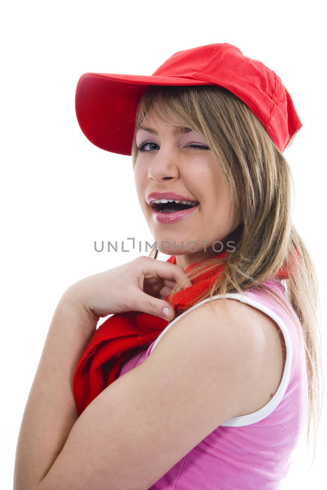 Beautiful  young woman in red cap on isolated background