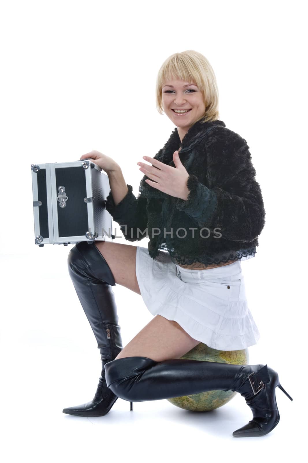 Beautiful blonde with valise and globe on isolated background