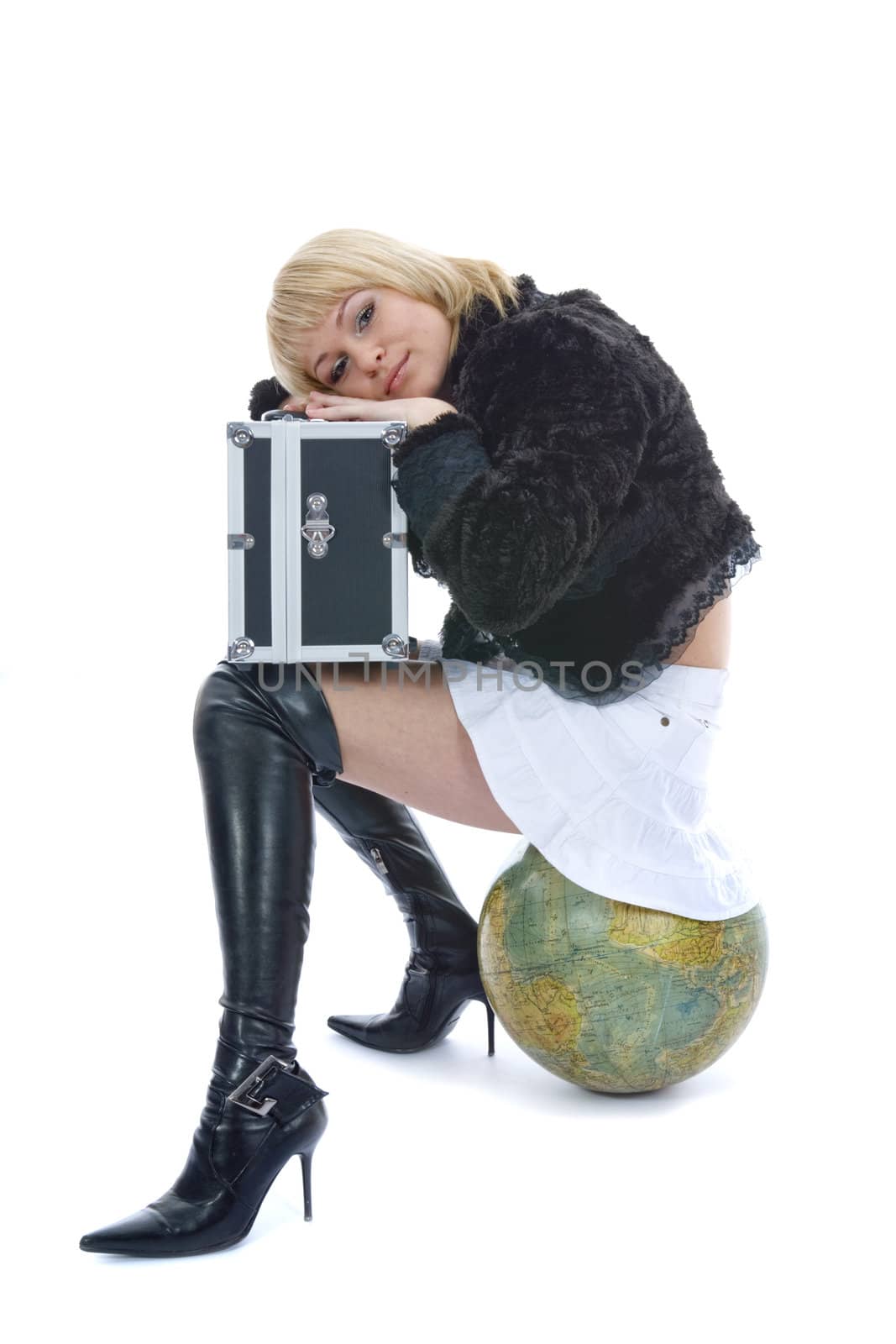 Beautiful blonde with valise and globe on isolated background