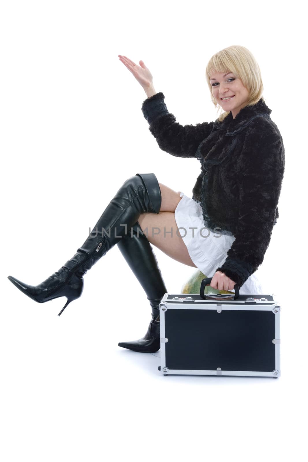 Beautiful blonde with valise and globe on isolated background