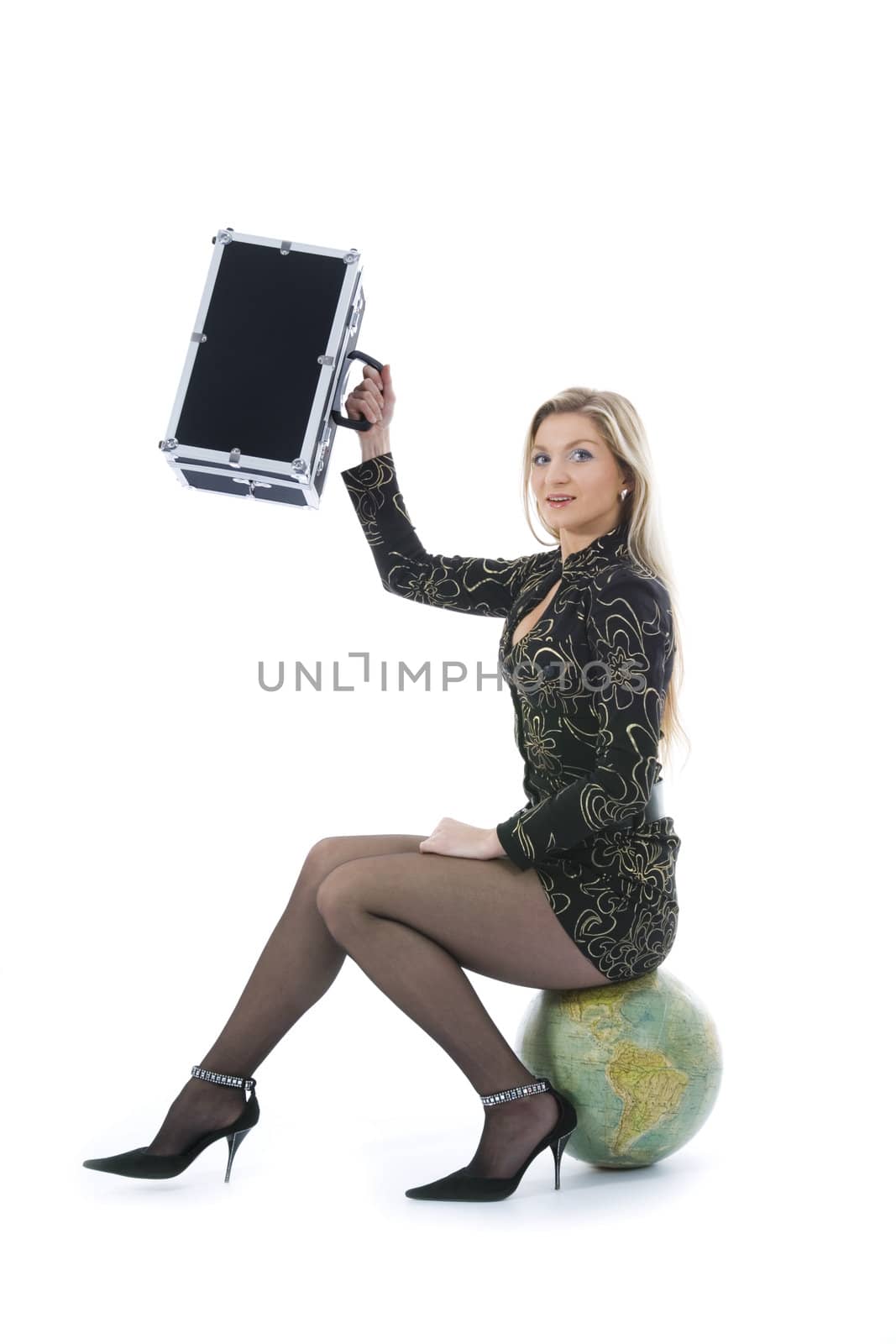 Beautiful blonde with valise and globe on isolated background