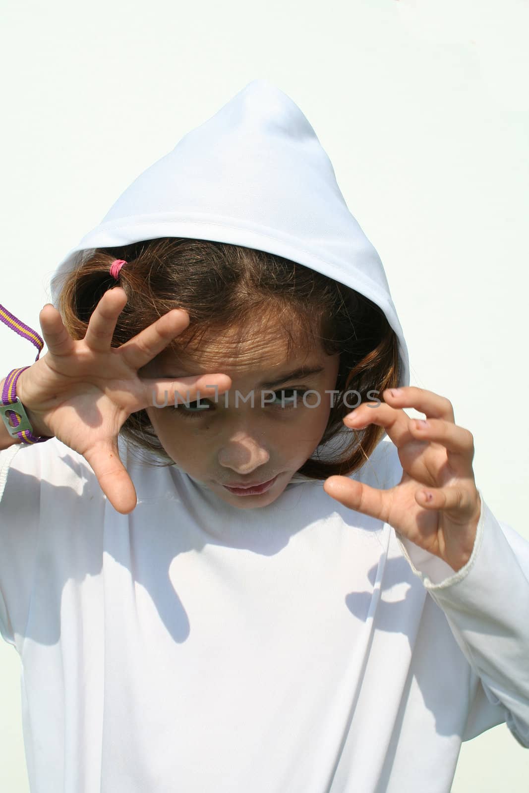 Young girl in ghost costume isolated