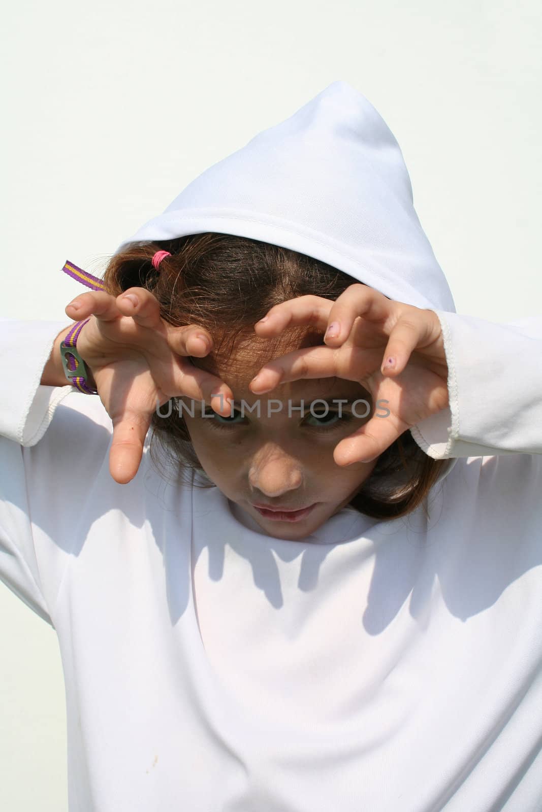 Young girl in ghost costume isolated