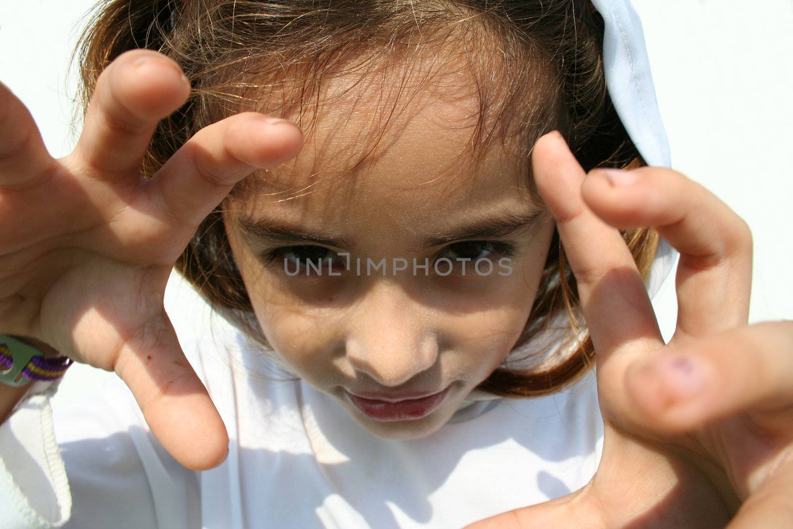 Young girl in ghost costume isolated