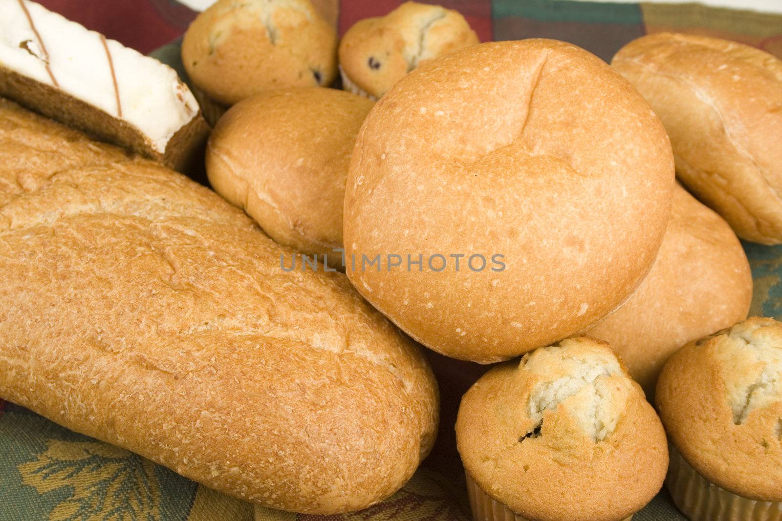 assortment of breads on nice table clth