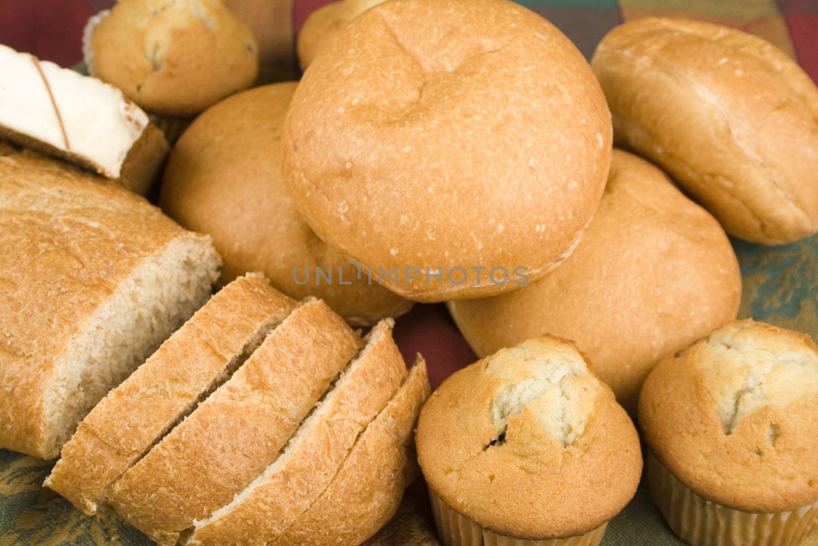 assortment of breads on nice table clth