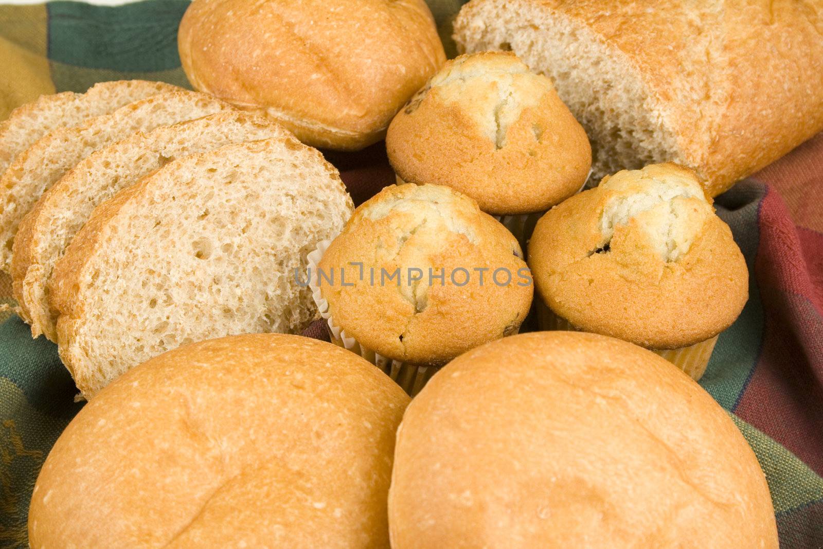 assortment of breads on nice table clth