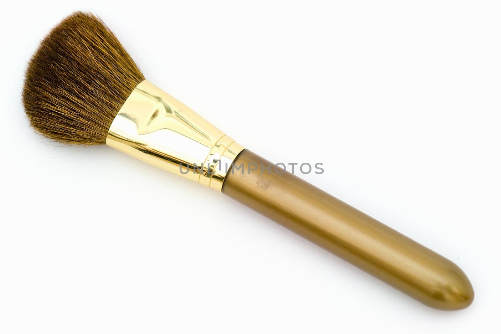 Brush for a make-up on a white background