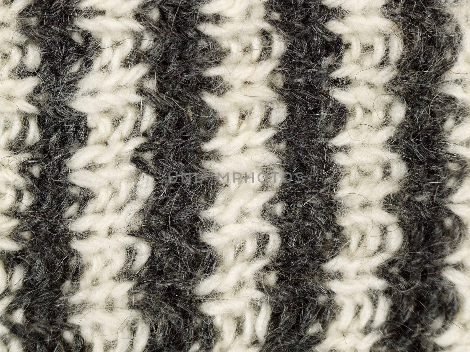 Close-up of striped wool socks. Woolen background.