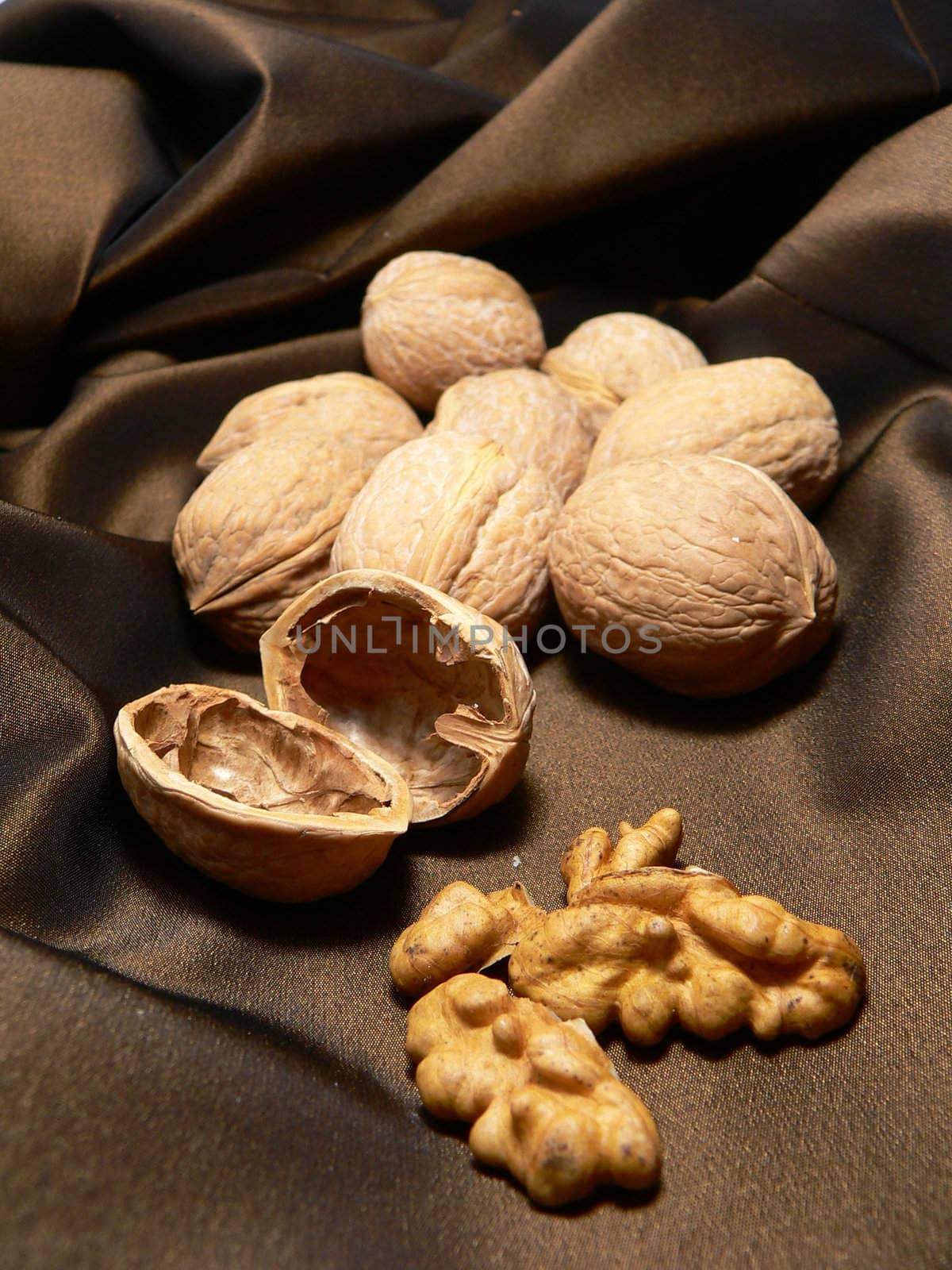walnuts on brown silk cloth