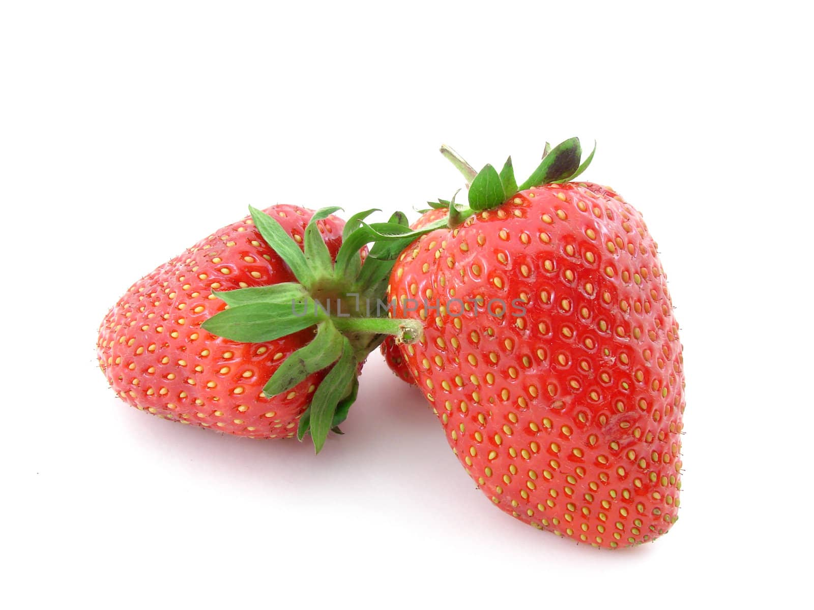 Strawberries isolated over white background.