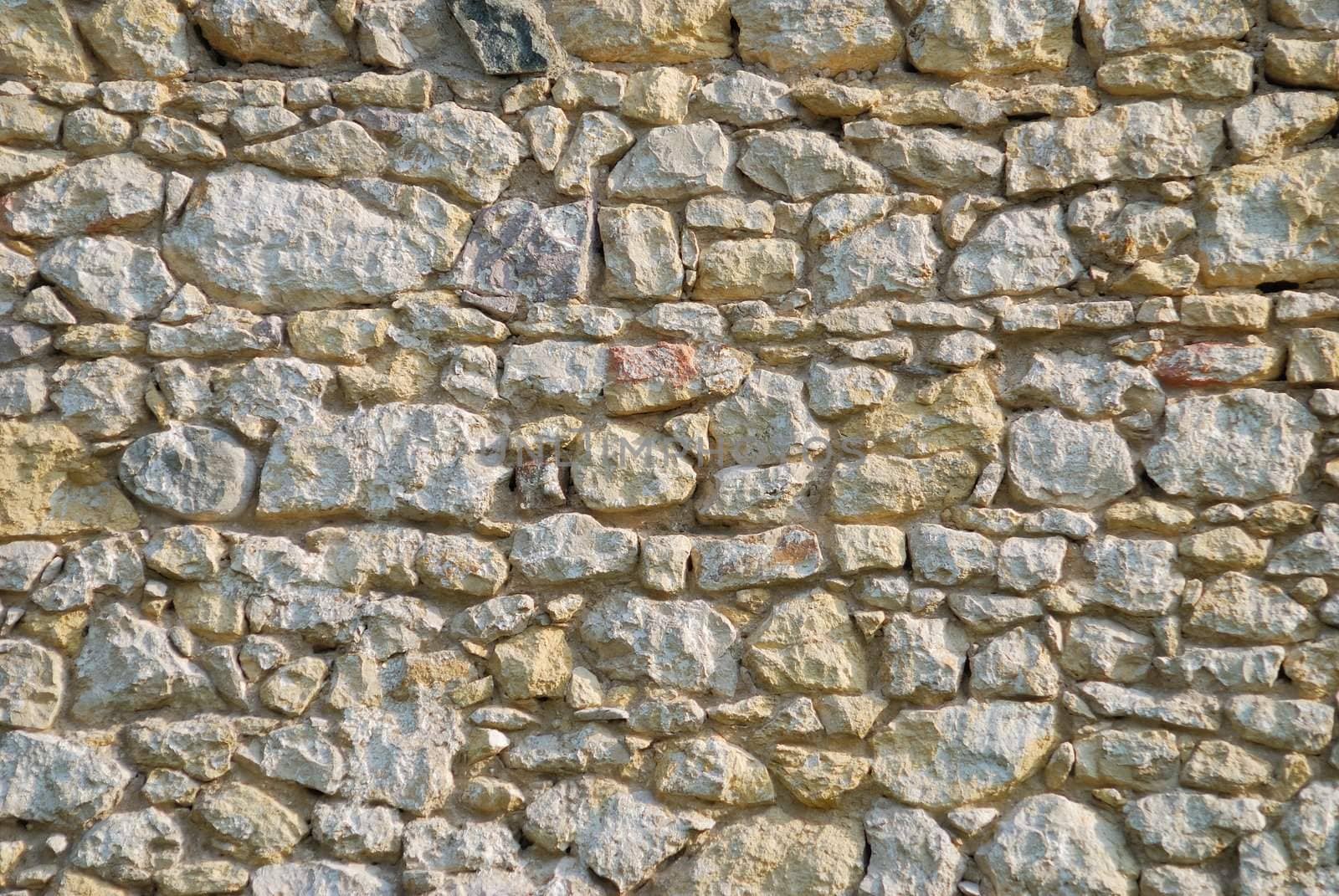antique wall background of stone pieces