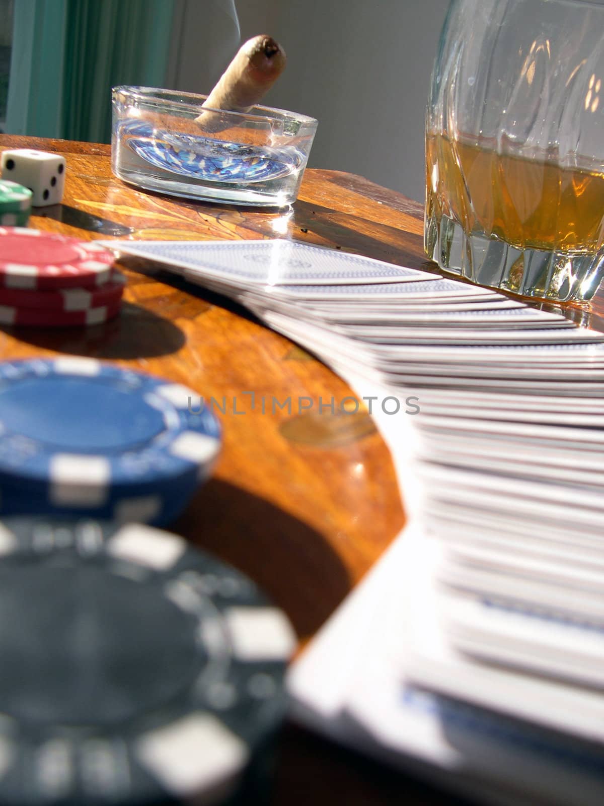 Scotch, cards, dice, poker chips, and a cigar. all bad habits, and poential addictions.