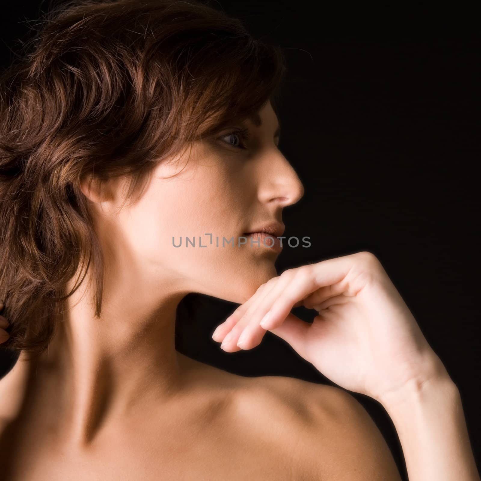 Studio portrait of a pretty brunette lady