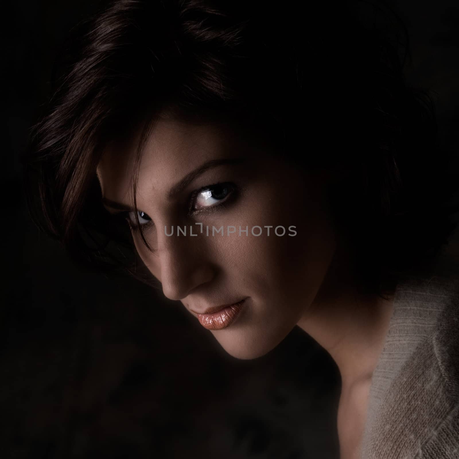 Studio portrait of a pretty brunette lady