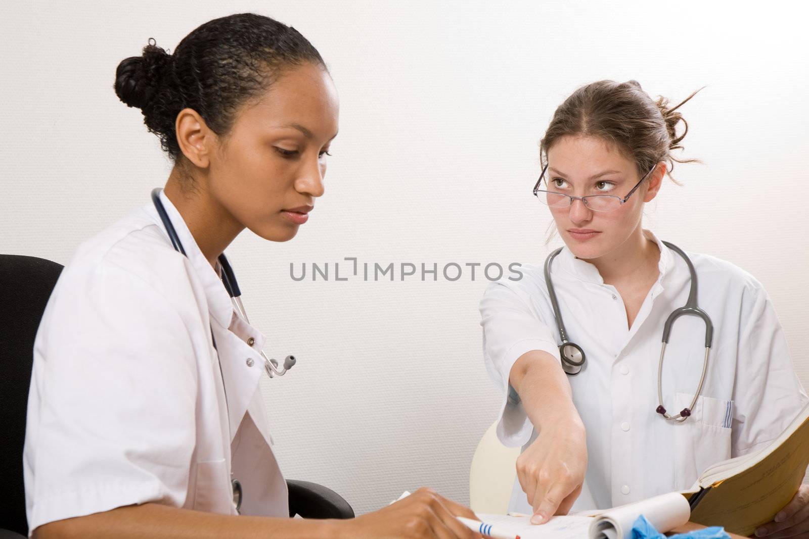 Two medical students working together for their exams