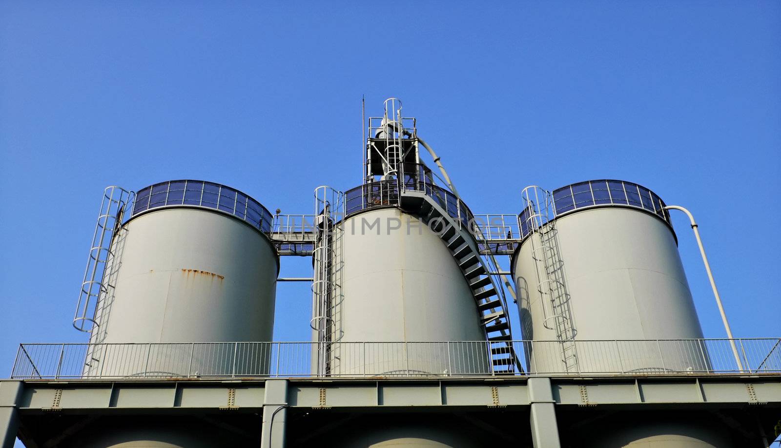 huge industrial reservoir barrels by yuriz