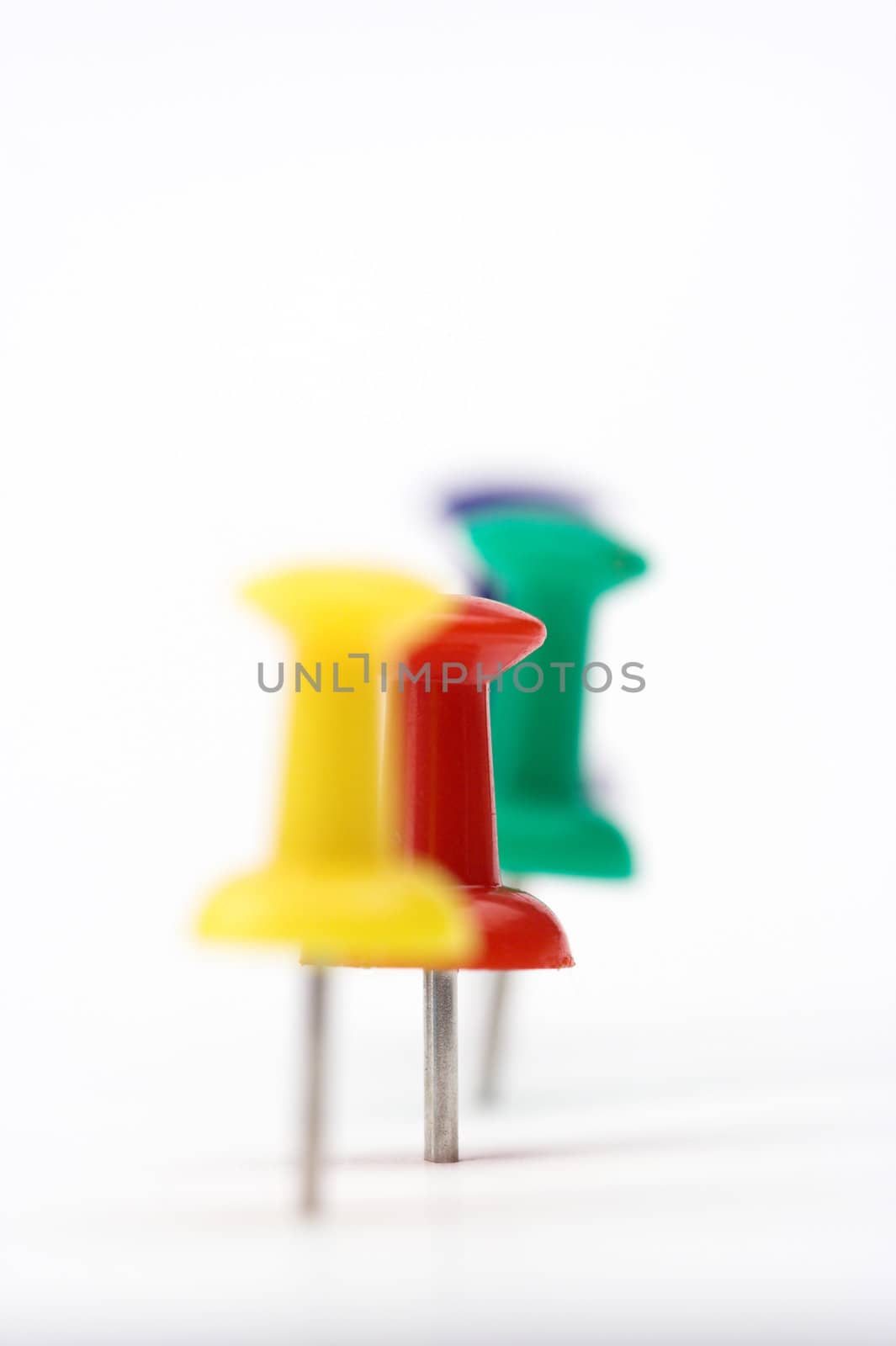 Close up of color pushpins with  shallow DOF