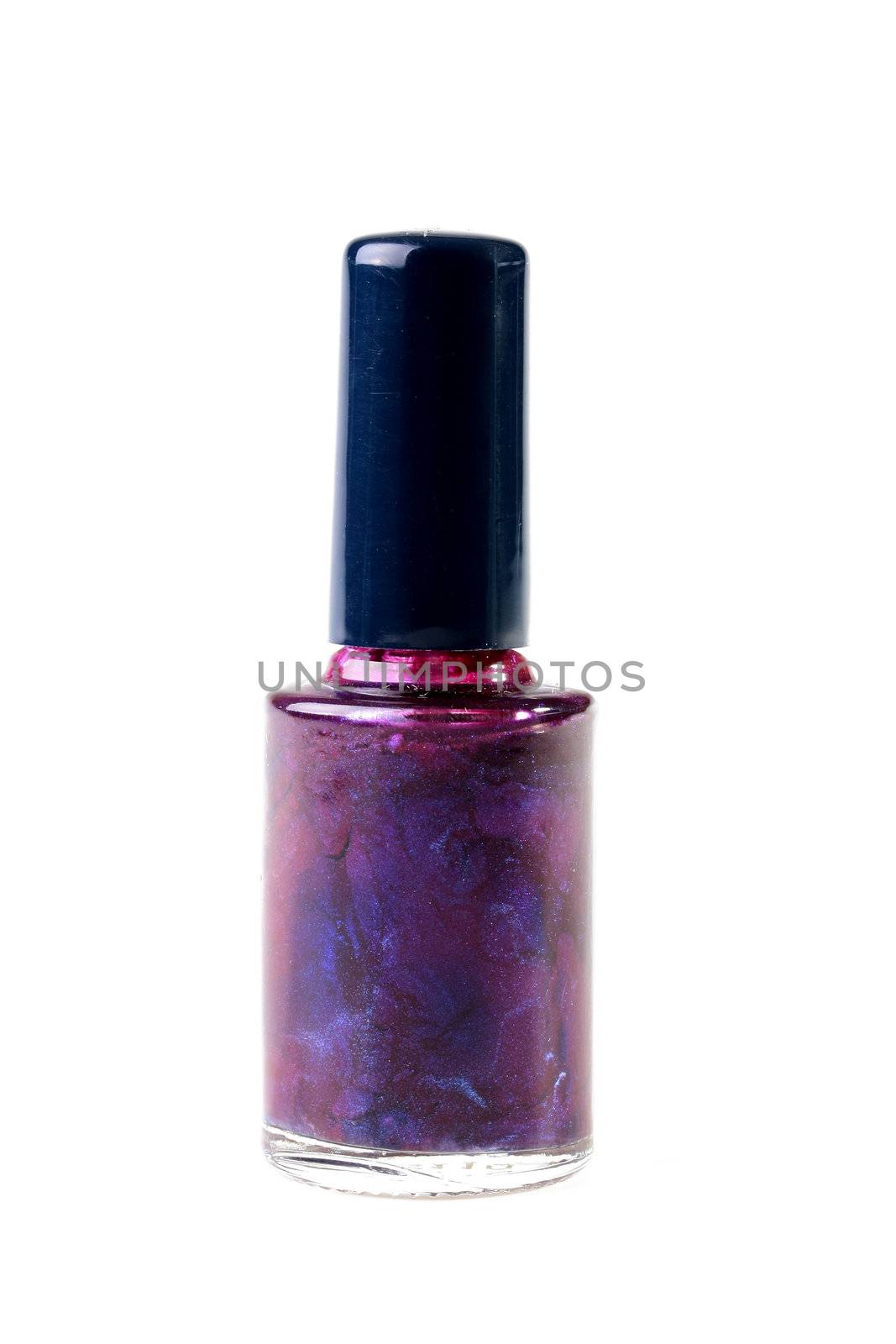 The small bottle with pink nail polish, is used in the course of manicure.