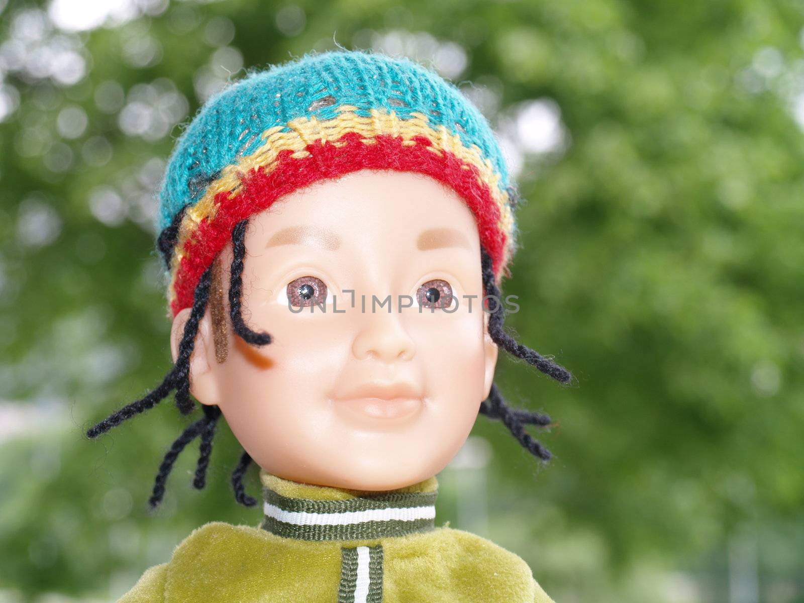 boy doll wearing rasta