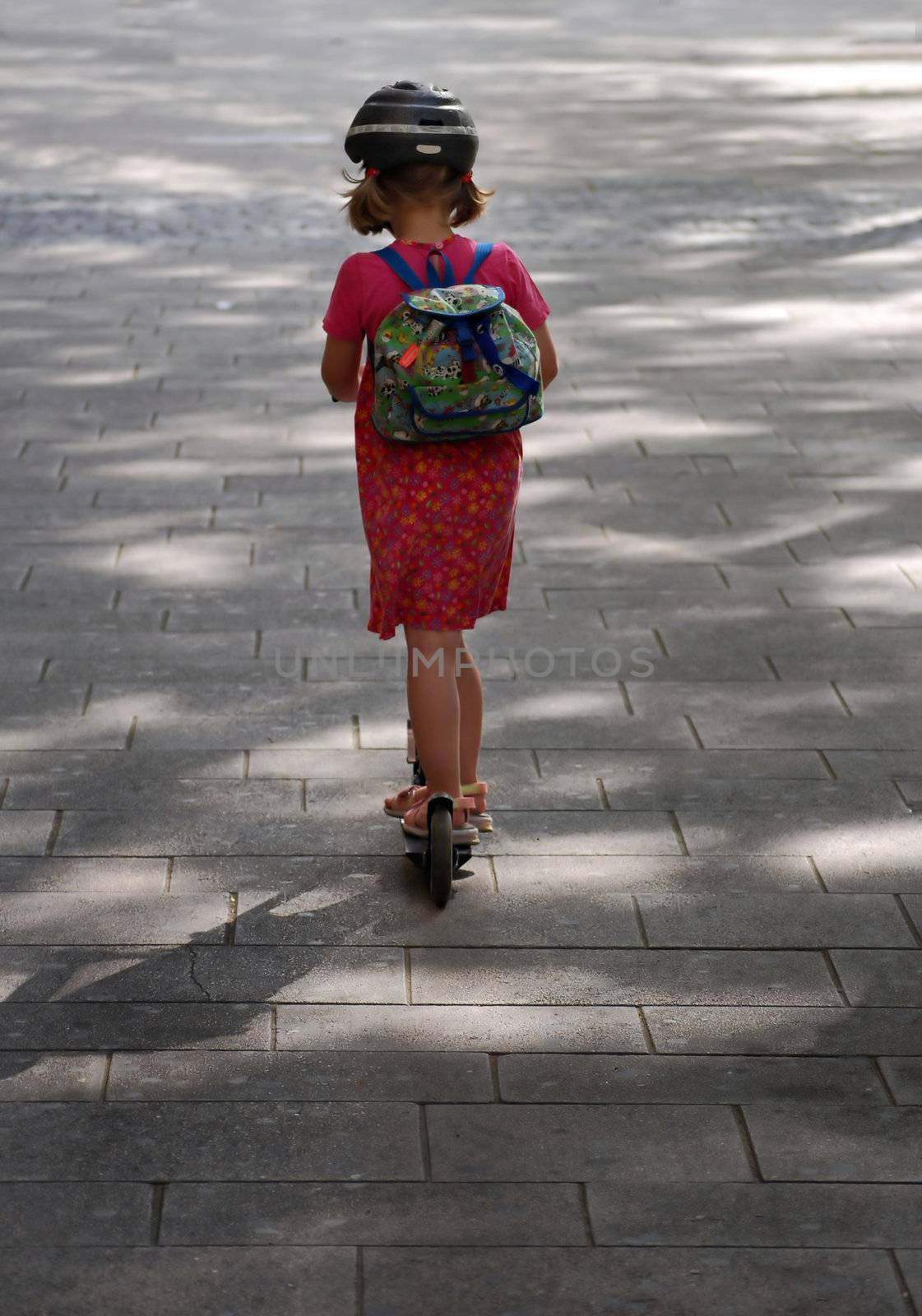 Young girl on her way to school in Vienna, Austria