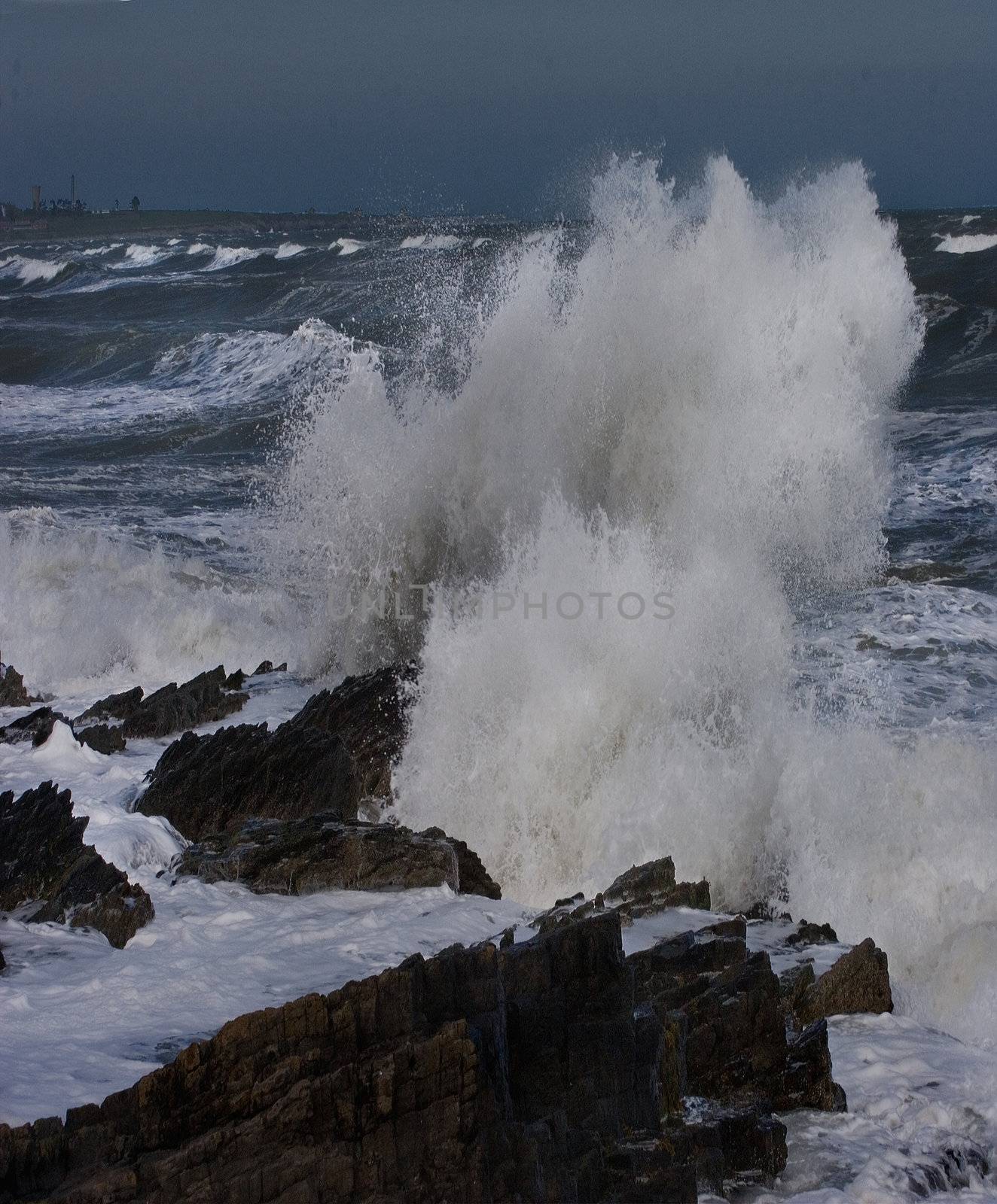 Waves breaking on the shore on the East coast of Ireland.